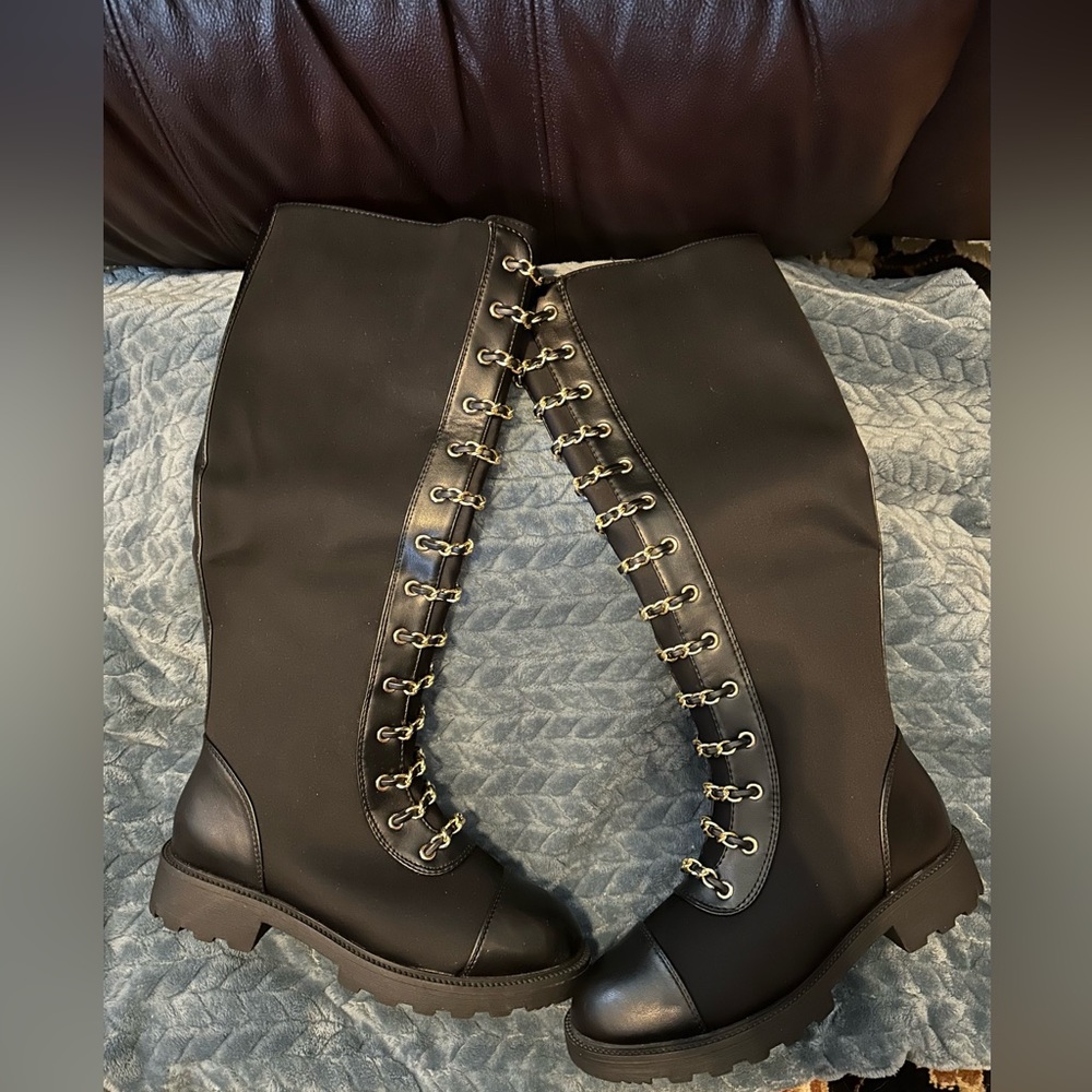 Never worn black faux lace up tall combat boots